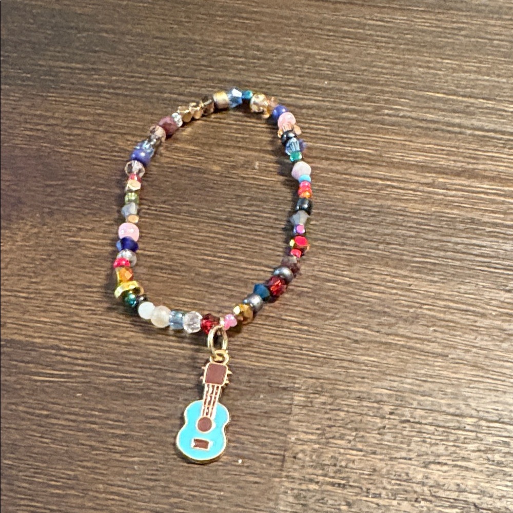 Hand Crafted Multicolor Beaded Bracelet with Guitar Charm